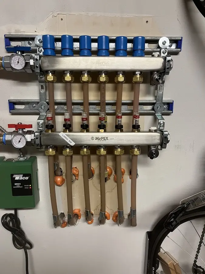 Plumber performing Water Heater Repair at a residential property in La Porte